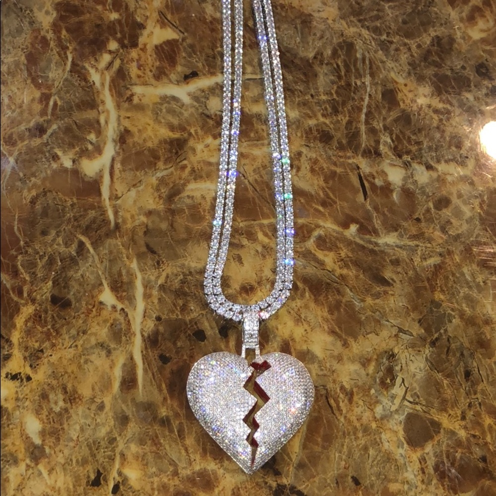 Iced out broken heart pendant